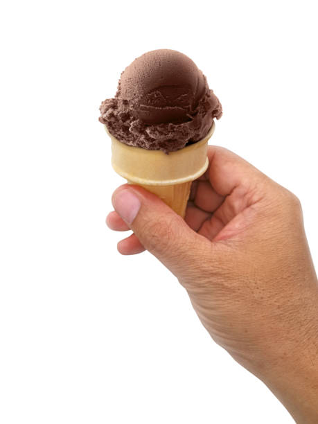 istock A man hand holding an ice cream cone on a white background 1396196813