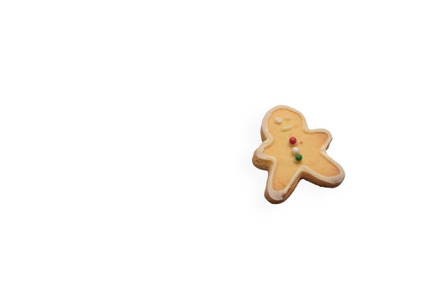 Homemade gingerbread man cookie isolated on white background.