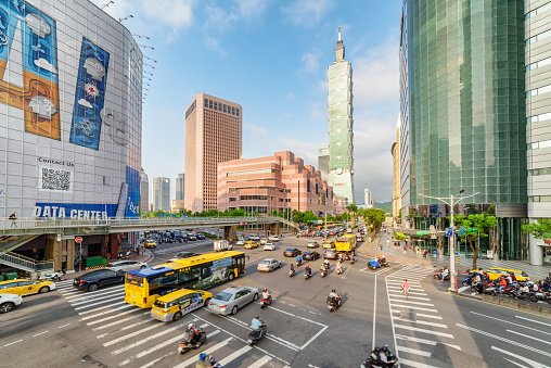 Taipei, Taiwan - April 26, 2019: Scenic evening view of intersection of Xinyi Road and Keelung Road at downtown. Taipei 101 (Taipei World Financial Center) is visible at right. Day traffic.