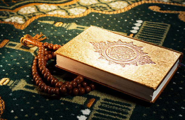 istock Quran and prayer beads concept. 1396202339