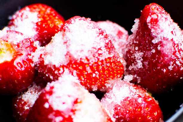 istock strawberries with sugar . The first flying fruits 1396204016