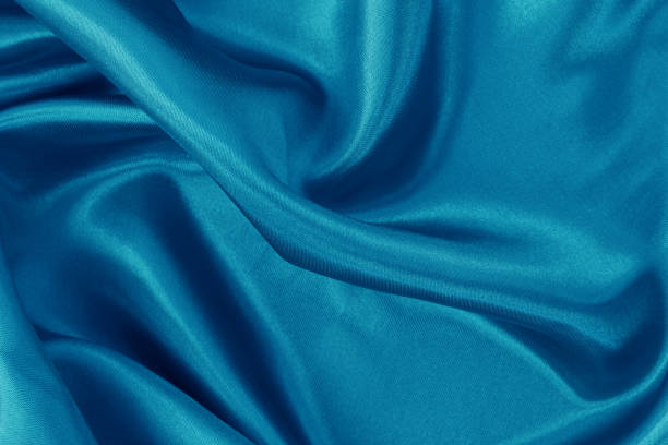 istock Blue fabric cloth texture for background and design art work, beautiful crumpled pattern of silk or linen. 1396206598