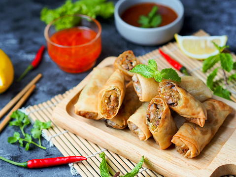 Spring rolls, Egg rolls filled with vegetables serve with sweet and sour dipping sauce.