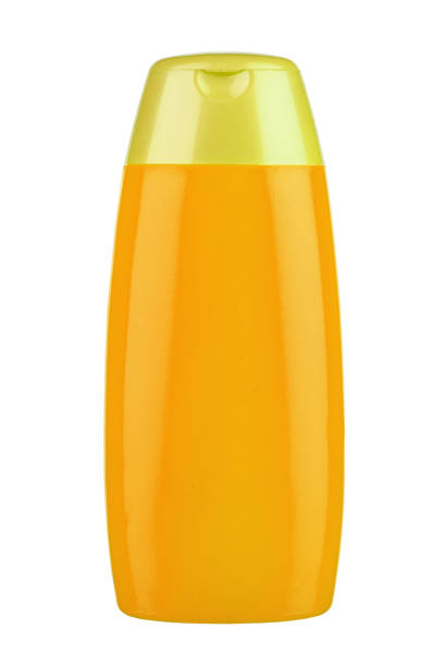 istock Yellow bottle for shampoo isolated on white background. Ready for your design. 1396210255