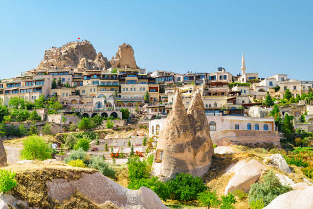 Uchisar Castle at Goreme Historical National Park in Cappadocia View of Uchisar Castle at Goreme Historical National Park in Cappadocia, Turkey. Amazing landscape. Cappadocia is a popular tourist destination of Turkey. uchisar stock pictures, royalty-free photos & images