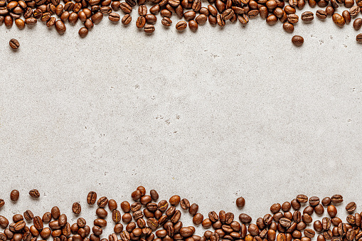 Coffee border over old liht stone background with empty space