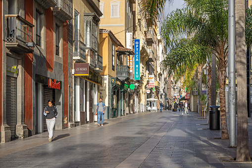 View up a pedestrian street in the early morning in Santa Cruz which is the main city on the Spanish Canary Island Tenerife