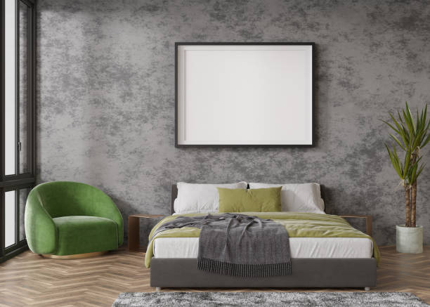 istock Empty horizontal picture frame on concrete wall in modern bedroom. Mock up interior in contemporary style. Free, copy space for your picture, poster. Bed, plant, green armchair. 3D rendering. 1396213974