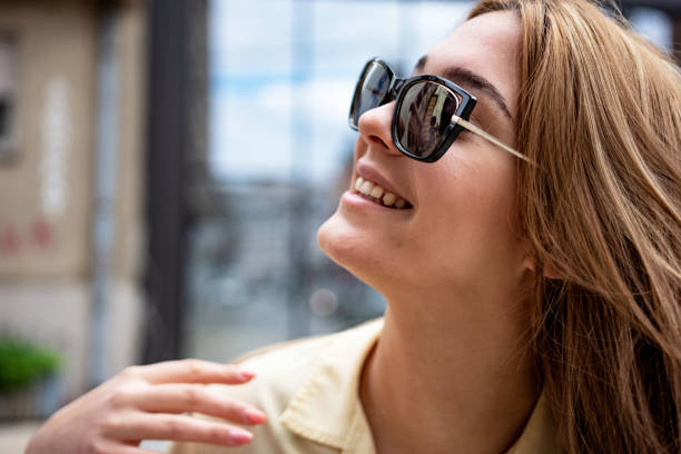 istock Young smiling woman spending time in the city 1396213980