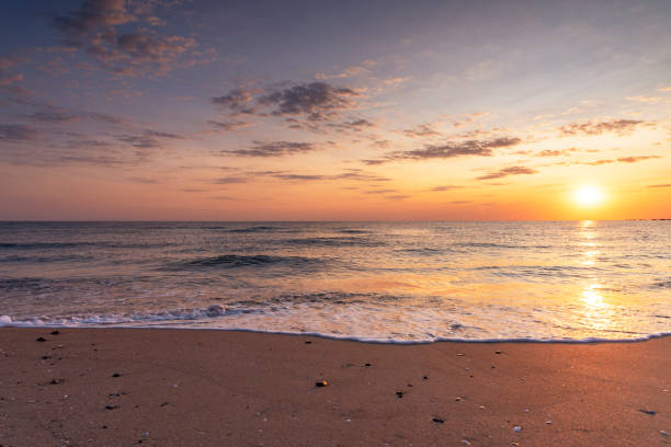 istock Colorful ocean beach sunrise. 1396215218