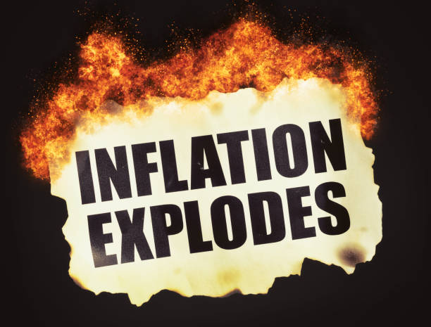 istock Inflation Explodes, says burning newspaper headline cutting with burnt edges 1396216207