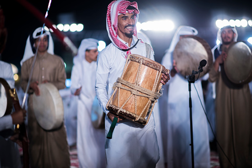 Mértola, Portugal - May 19, 2019: A traditional folklore music group performs in the village of Mértola in Alentejo, Portugal, during the closure of a folklore festival.