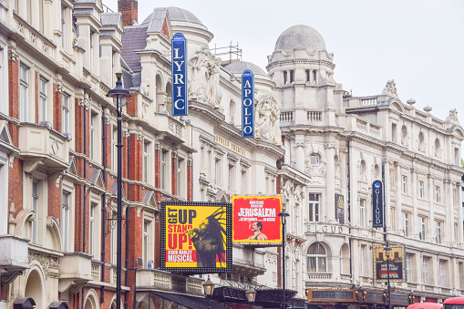 London, UK - April 23 2022: Theatres on Shaftesbury Avenue in London's West End, daytime view.