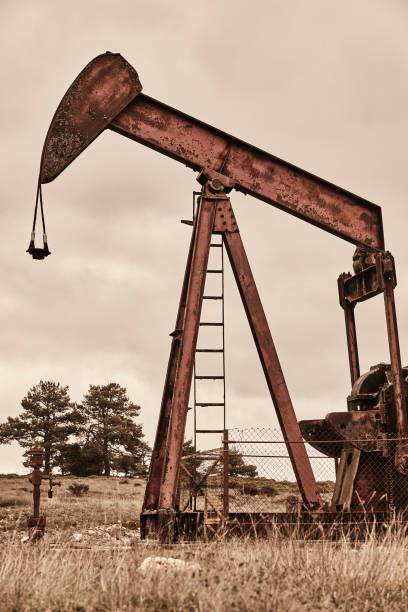 Rusty oil pumping machine. Pump jack in Ayoluengo, Burgos. Spain