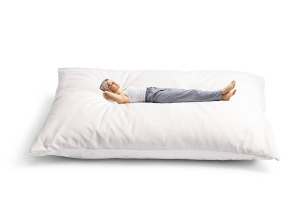 istock Young woman resting on a big pillow 1396231199