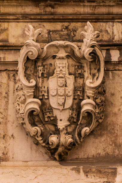 istock Stone ancient heraldic coat of arms on the wall 1396244297