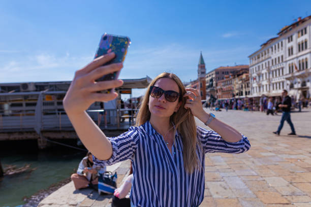 istock Female tourist on vacation in Venice 1396244328