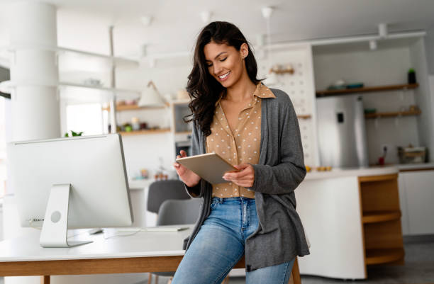 istock Attractive business woman working on computer. Business technology people concept. 1396244540