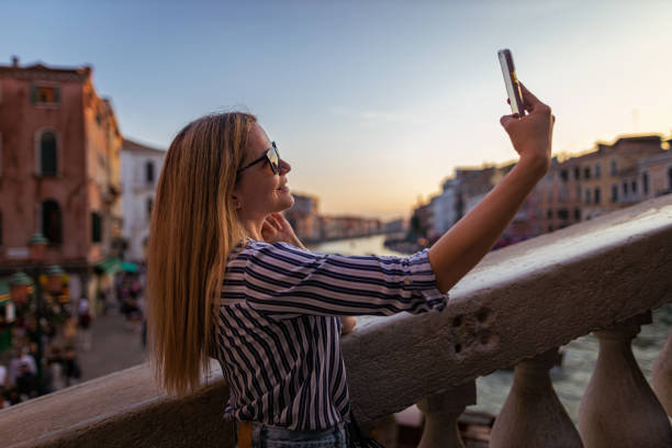 istock Lovely woman taking selfie 1396245930
