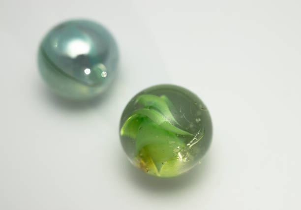istock colored marbles. close-up macro photo. on white background 1396247091