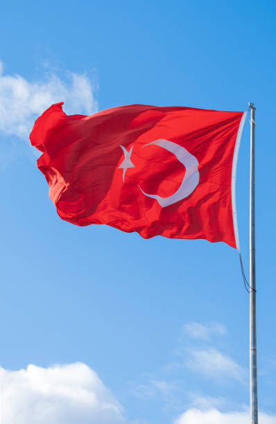 istock Turkish flag waving in the blue sky, flagpole, 1396249025
