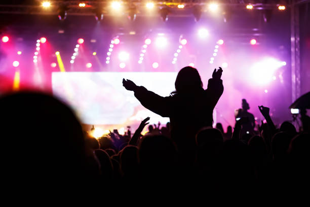 istock Raised hands of the fan during a concert. 1396249500