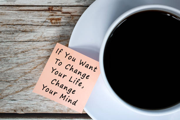 istock Motivational and inspirational quote on notes with coffee cup 1396250878