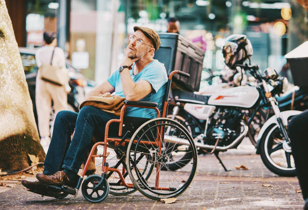 istock Man in a wheel chair 1396255539