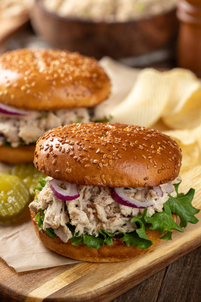 istock Tuna salad and lettuce sandwich on sesame seed bun 1396256509