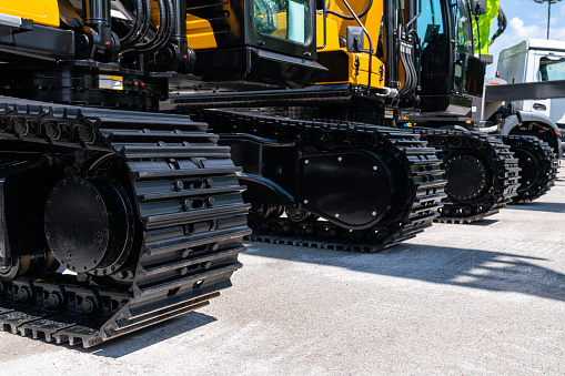 Construction excavator tracks close up