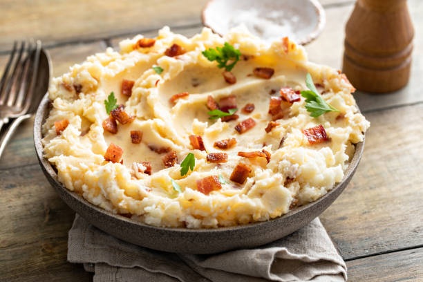 istock Bacon mashed potatoes with cheddar cheese and parsley 1396260567