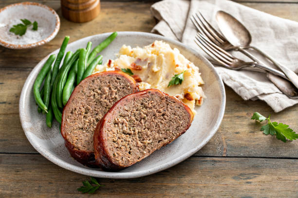 Meatloaf with mashed potatoes and green beans stock photo