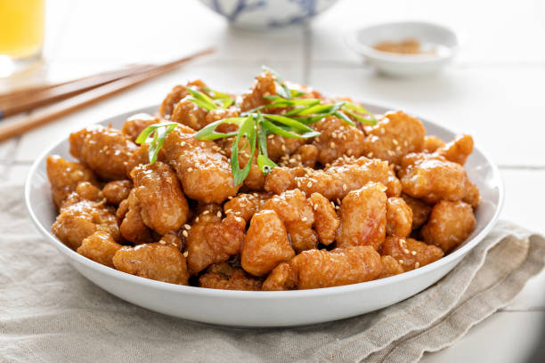 istock Orange chicken with green onions and sesame seeds 1396261171