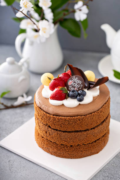 istock Chocolate cake for Mother's day with berries and chocolate topping 1396261700