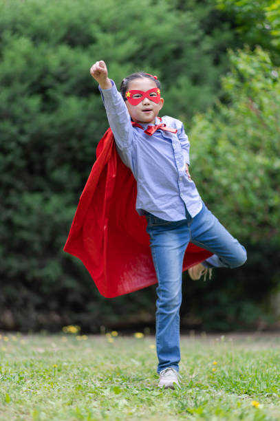 istock Supergirl Flying 1396262277
