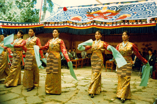 In the Shoton Festival, has a lot of performances and competitions.Most performances are held in Norbulingka Park,people watched it with great relish.Film photo in August 1995's Lhasa