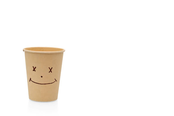 istock Happy face on eco  paper cup isolated. 1396264182