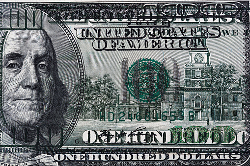 fragment of new 100 dollar banknote for design purpose