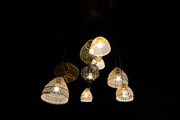 istock Local shaped lamps on ceiling against dark background 1396272724