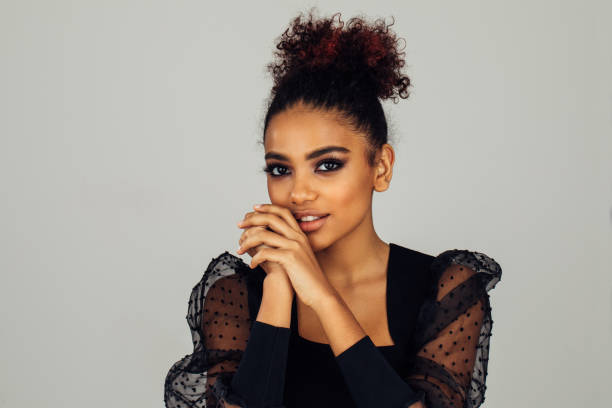 istock Beautiful afro woman with perfect make-up 1396275731