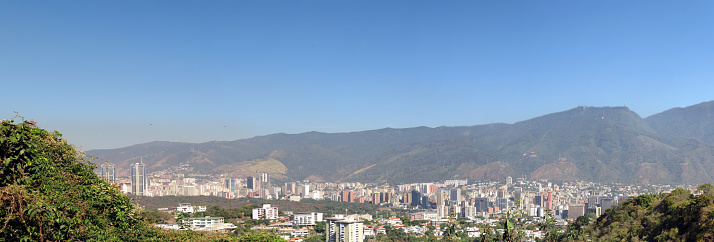 Panoramic view of the city of caracas from hills of Bello Monte with the hill the Ávila in the background, Venezuela