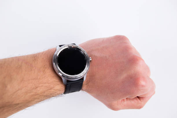 istock round smart watch on a male hand on a white background 1396282422