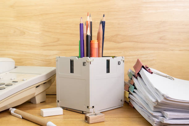 istock concept recycle floppy disk, Creative objects used for obsolete furniture 1396282564