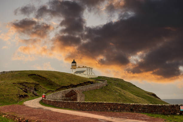 istock Road Leading To A Lighthouse. 1396282631