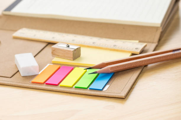 istock pencil on notebook concept education school equipment on wood table 1396283178