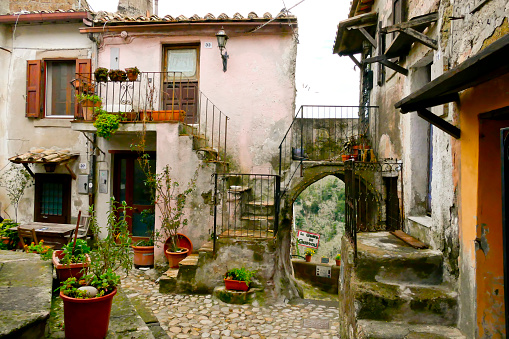 Calcata is a typical medieval village in central Italy with narrow alleys animated by the \npresence of cats and cats