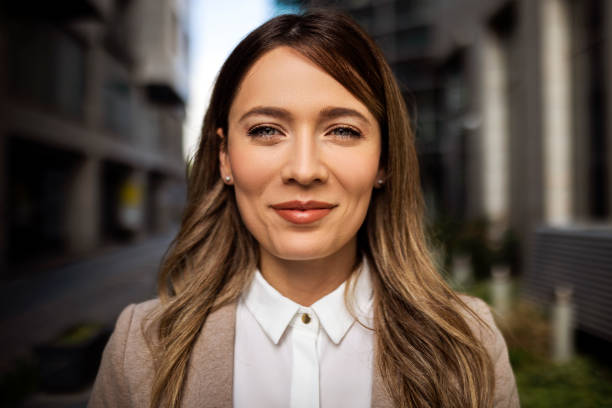 istock Young businesswoman standing alone looking at camera 1396285305