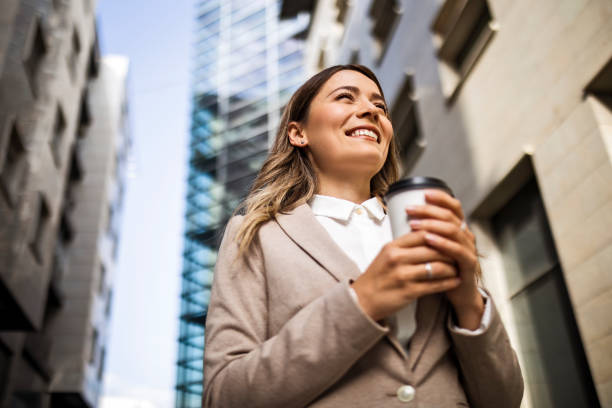 istock Young businesswoman standing alone 1396285314