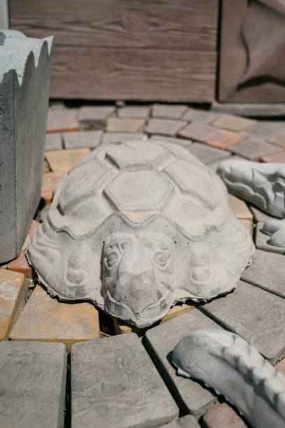 istock concrete figure of a turtle.Stone statue of a turtle 1396297209