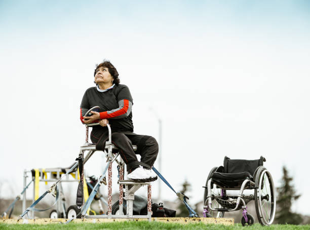 istock Senior disabled Latin lady practising discus throwing 1396298396
